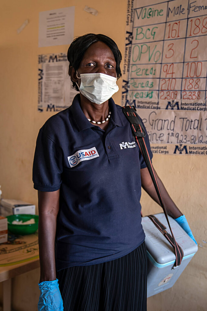 Nyakony Karar Akaydeng prepares to vaccinate children and pregnant women at the health clinic in Renk, South Sudan.