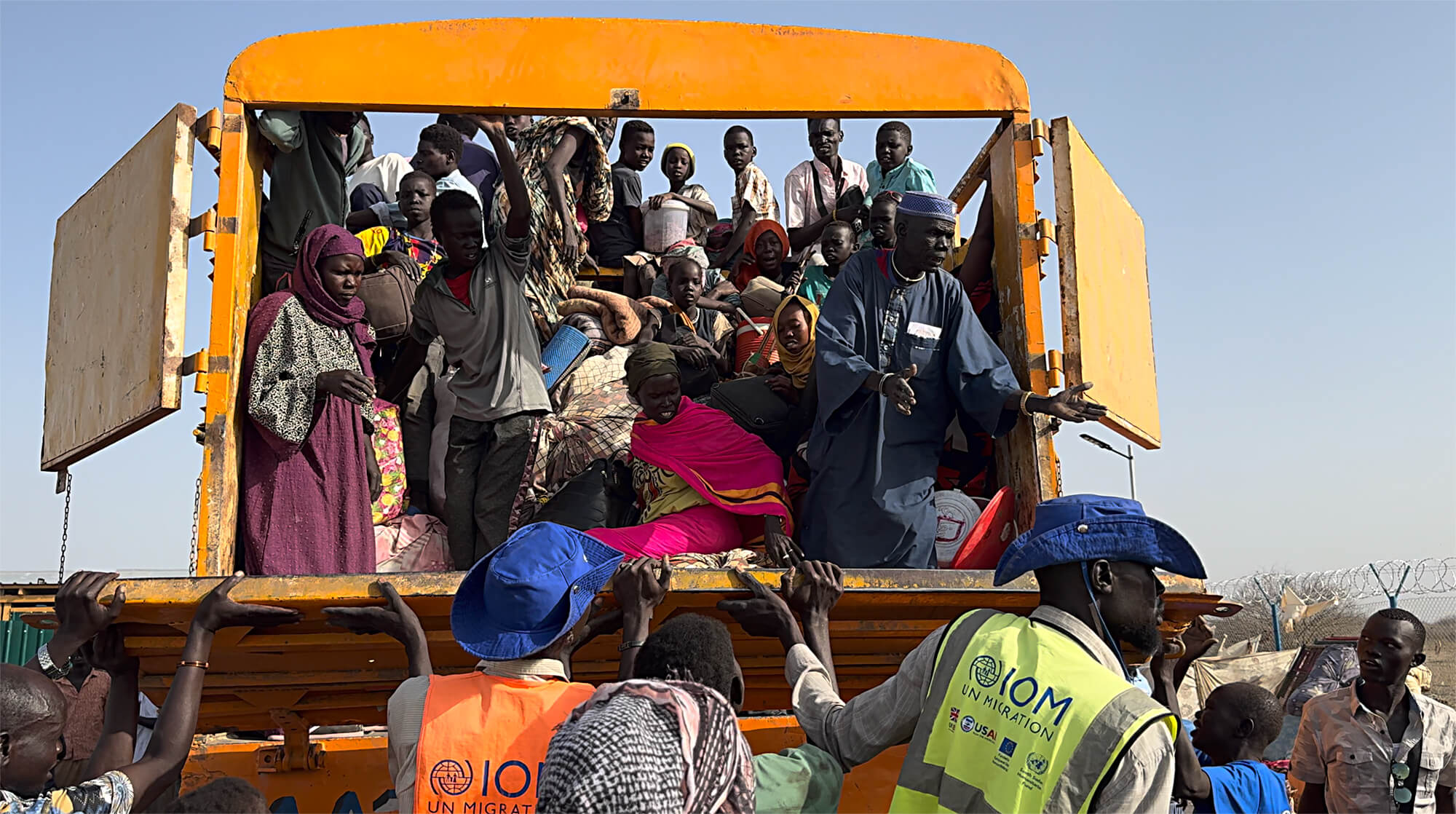 Returnees from the transit camps in Renk, South Sudan, board a truck that will take them to the port in Renk. There, a boat will transport them and their belongings along the White Nile River to Malakal.